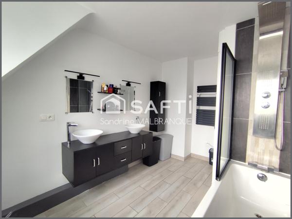 Maison semi-individuelle de semi-plain pied avec sous sol ,3 chambres et jardin