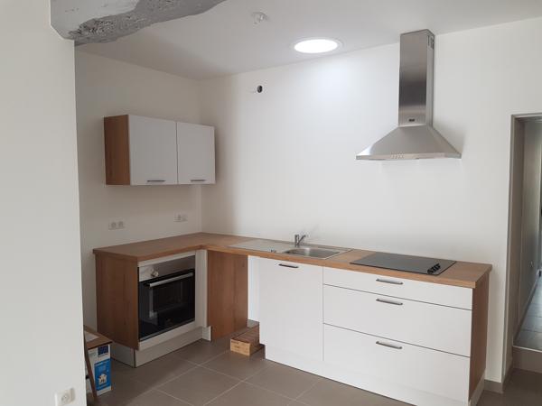 3 pièces 70 m² Duplex place de l'Eglise