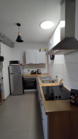 3 pièces 70 m² Duplex place de l'Eglise