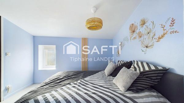 Ensemble immobilier rénové avec piscine.