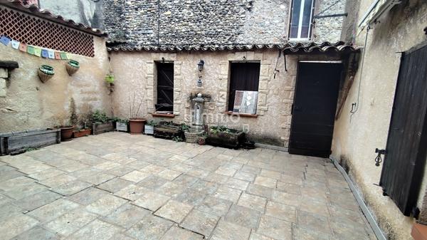 Maison de village 7 pièces + terrasses et garage.