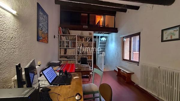 Maison de village 7 pièces + terrasses et garage.