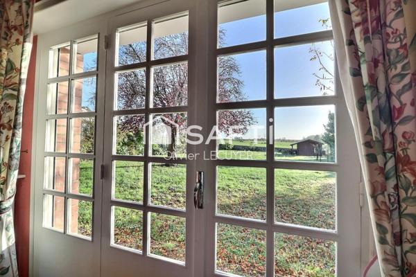 Pavillon individuel des années 70 à conforter, sous-sol complet, avec vue d'exception sur la campagne tout en étant en ville !