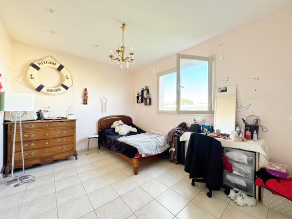 Appartement à l'étage d'une maison divisée en 2 lots (avec terrain)