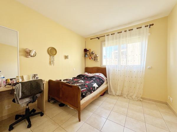 Appartement à l'étage d'une maison divisée en 2 lots (avec terrain)