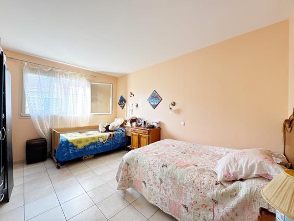 Appartement à l'étage d'une maison divisée en 2 lots (avec terrain)