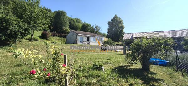 Maison de plain-pied et grange en pierres