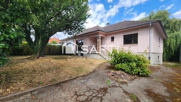 Maison familiale de 121 m² avec 3 chambres.