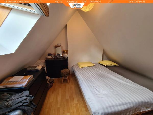 Maison jumelée d'un coté