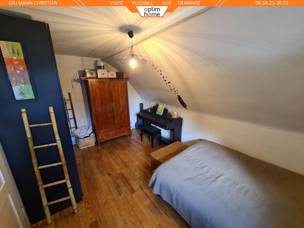 Maison jumelée d'un coté