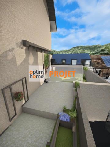 Maison jumelée d'un coté