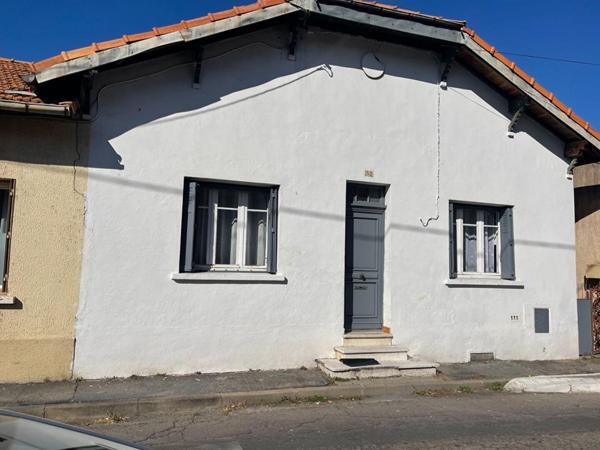 A vendre maison mitoyenne  3 pièces de  65 m2 avec grand garage sur terrain de 295 m2
