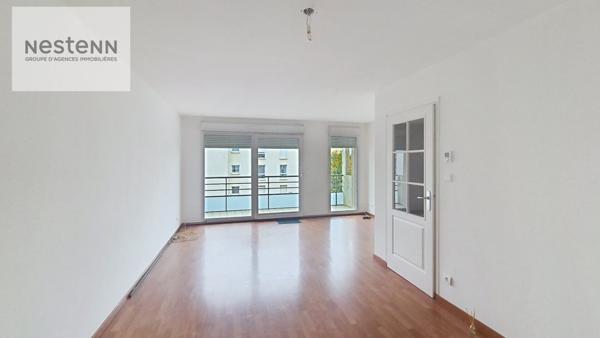 Appartement de 64 m2 comprenant 2 chambres + balcon + ascenseur + parking privé dans résidence sécurisée