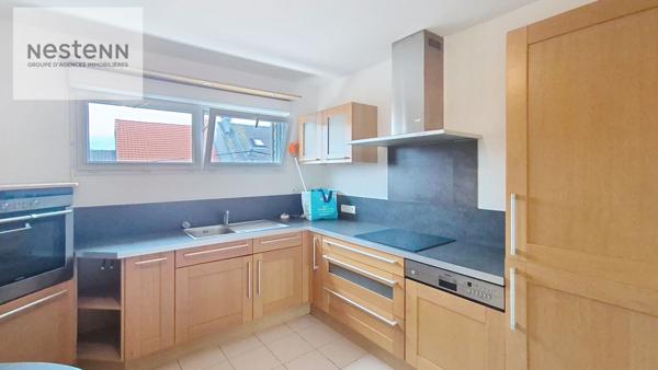 Appartement de 64 m2 comprenant 2 chambres + balcon + ascenseur + parking privé dans résidence sécurisée