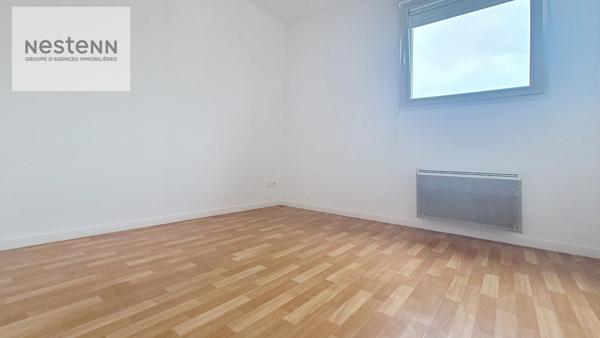 Appartement de 64 m2 comprenant 2 chambres + balcon + ascenseur + parking privé dans résidence sécurisée