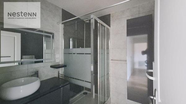 Appartement de 64 m2 comprenant 2 chambres + balcon + ascenseur + parking privé dans résidence sécurisée