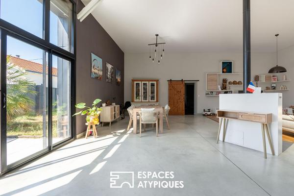 Loft design aux volumes généreux, proche de toutes les commodités