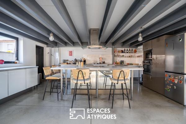 Loft design aux volumes généreux, proche de toutes les commodités