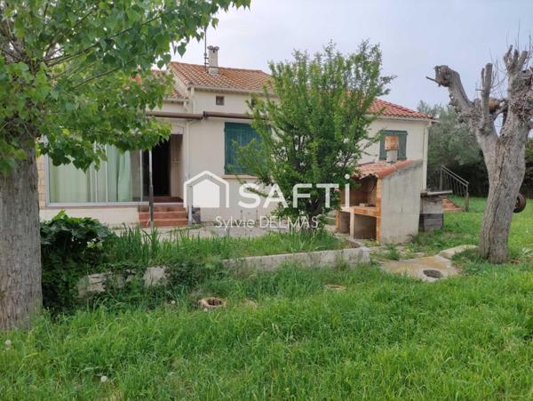 A SAISIR BELLE PARCELLE CONSTRUCTIBLE AVEC MAISON
