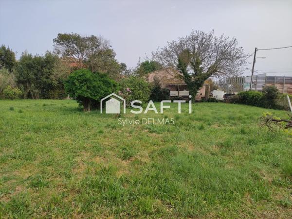 A SAISIR BELLE PARCELLE CONSTRUCTIBLE AVEC MAISON