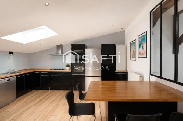 Un loft de caractère de 280 m² complété par 320 m² d'espaces aux multiples possibilités