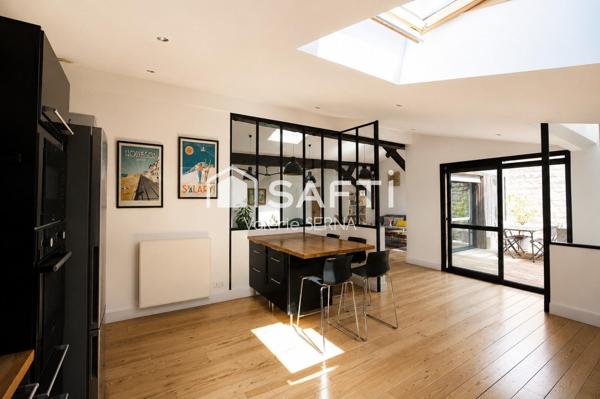 Un loft de caractère de 280 m² complété par 320 m² d'espaces aux multiples possibilités