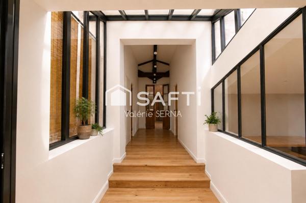 Un loft de caractère de 280 m² complété par 320 m² d'espaces aux multiples possibilités