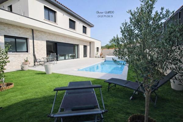 Maison  6 pièces de 160 m2 sur terrain de 500 m2 avec piscine