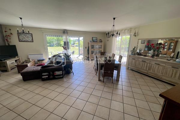 A 10 minutes de Lalinde, nichée sur les hauteurs de Couze-et-Saint-Front, au cœur d’un environnement calme et recherché, cette élégante maison contemporaine de plain-pied exposée plein sud, offre 130 m² habitables. 
Parfaitement agencée, soigneusement entretenue et très lumineuse grâce à ses larges baies vitrées, elle se compose d'une entrée avec placard, d'une cuisine ouverte sur un vaste séjour chaleureux agrémenté d'un poêle à bois, ainsi que d'un cellier/buanderie avec accès direct à l'extérieur.
Côté nuit, elle comprend quatre chambres, une salle de bains équipée d'une double vasque, d'une baignoire et d'une douche, ainsi qu'un WC indépendant avec lave-mains.
Côté dépendances, la propriété dispose d'un grand garage fermé avec eau et électricité d'environ 44 m² , surmonté d'une vaste mezzanine offrant un bel espace de stockage ou d'aménagement, d'un second garage ouvert, d'un carport, d'un abri de jardin et d'un poulailler.
L'ensemble est implanté sur un terrain clos de 4 299 m², idéal pour profiter pleinement de la tranquillité des lieux.
Les prestations techniques sont également au rendez-vous : chauffage électrique, ballon thermodynamique, assainissement individuel conforme, ainsi que 12 panneaux photovoltaïques installés en 2024 permettant l'autoconsommation, avec revente du surplus d'électricité produit.
Une propriété fonctionnelle, lumineuse et économe en énergie, idéale pour une vie de famille au cœur d'un cadre privilégié.
Bien disponible à la visite 7 jours sur 7. Intercabinet et collaboration entre professionnels de l’immobilier bienvenus.
Nestled on the heights of Couze-et-Saint-Front, in the heart of a quiet and sought-after environment, this elegant contemporary single storey house facing south, offers 130 m 2. 
Perfectly arranged, carefully maintained and very bright thanks to its large windows, it consists of an entrance with cupboard, a kitchen open to a large living room decorated with a wood stove, as well as a cellar/ laundry room with direct access to the outside.
On the night side, it has four bedrooms, a bathroom equipped with a double sink, a bathtub and a shower, as well as an independent WC with washbasin.
Outbuildings side, the property has a large closed garage with water and electricity of about 44 m 2, surmounted by a large mezzanine offering a beautiful storage or development space, a second open garage, a carport, a garden shed and a henhouse.
The whole is located on a closed ground of 4 299 m 2, ideal to take advantage fully of the tranquility of the places.
The technical services are also available: electric heating, a thermodynamic tank, individual sanitation in compliance, as well as 12 photovoltaic panels installed in 2024 allowing self-consumption, with resale of surplus electricity produced.
A functional, bright and energy-efficient property, ideal for a family life in the heart of a privileged setting.
Property available for viewing 7 days a week. Intercabinet and collaboration between real estate professionals welcome.