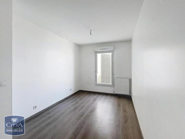 Appartement à louer 3 pièces 61.56m² Décines-Charpieu (69150)