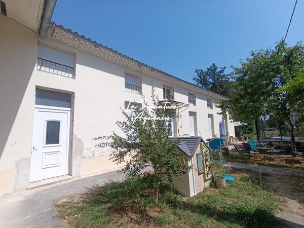 Ensemble Immobilier de 953 m2 avec parc arboré de 6598 m2 au bord de la Baïse – Lavardac centre