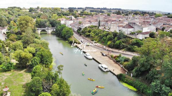 Ensemble Immobilier de 953 m2 avec parc arboré de 6598 m2 au bord de la Baïse – Lavardac centre