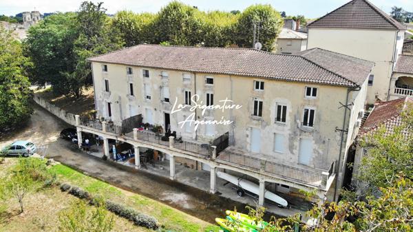 Ensemble Immobilier de 953 m2 avec parc arboré de 6598 m2 au bord de la Baïse – Lavardac centre