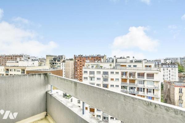Appartement au dernier étage avec terrasse et balcons