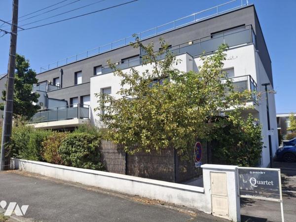 Couëron Bourg, appartement récent type 2 avec jardin et parking