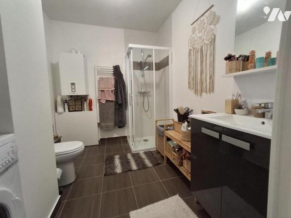 Couëron Bourg, appartement récent type 2 avec jardin et parking