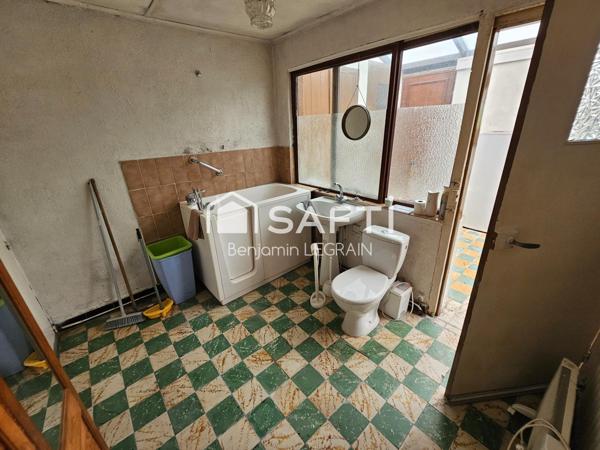 Maison semi-individuelle à rénover