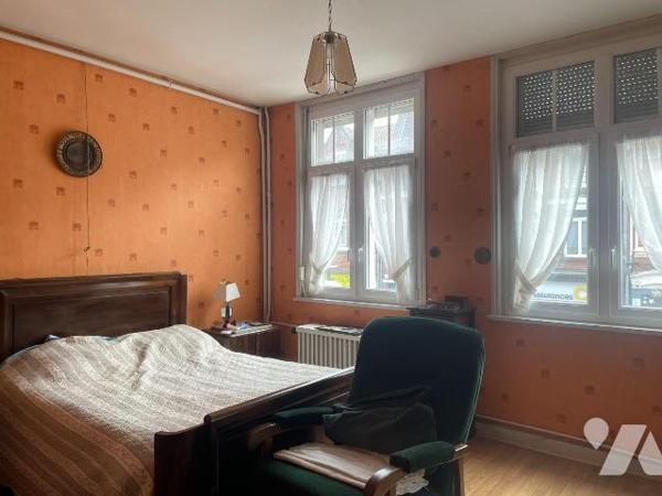  A VENDRE A BAILLEUL dans le Nord (59) : MAISON MITOYENNE EN PLEIN CENTRE VILLE AVEC VERANDA, T...