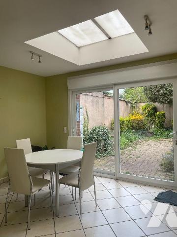  A VENDRE A BAILLEUL dans le Nord (59) : MAISON MITOYENNE EN PLEIN CENTRE VILLE AVEC VERANDA, T...