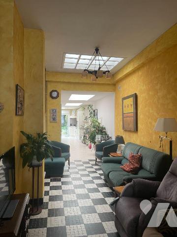  A VENDRE A BAILLEUL dans le Nord (59) : MAISON MITOYENNE EN PLEIN CENTRE VILLE AVEC VERANDA, T...