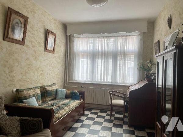  A VENDRE A BAILLEUL dans le Nord (59) : MAISON MITOYENNE EN PLEIN CENTRE VILLE AVEC VERANDA, T...