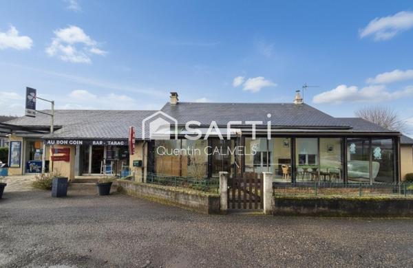 Ensemble immobilier à Nuces , maison de plain-pied et local commercial loué