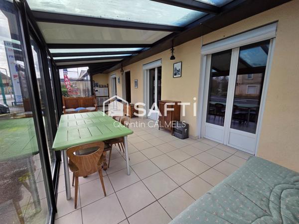 Ensemble immobilier à Nuces , maison de plain-pied et local commercial loué