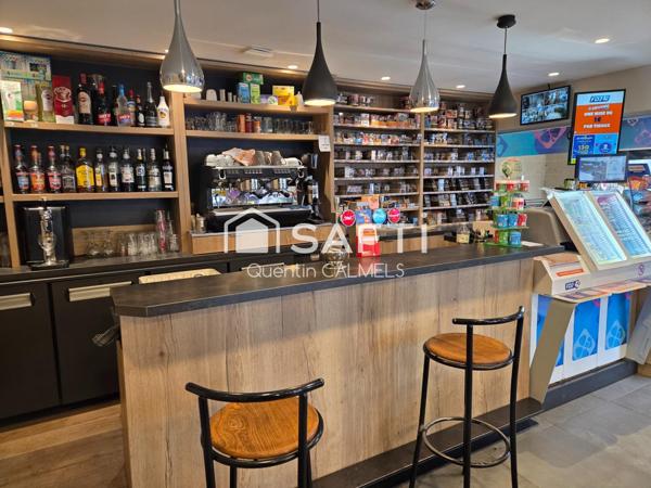 Ensemble immobilier à Nuces , maison de plain-pied et local commercial loué