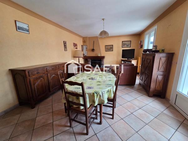 Ensemble immobilier à Nuces , maison de plain-pied et local commercial loué