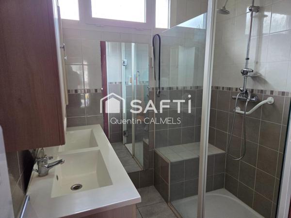 Ensemble immobilier à Nuces , maison de plain-pied et local commercial loué