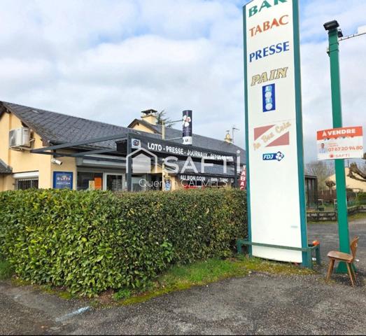 Ensemble immobilier à Nuces , maison de plain-pied et local commercial loué