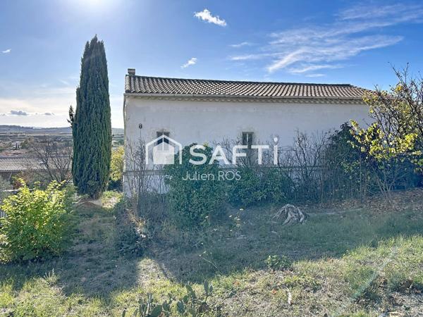 2575 m2 Terrain constructible avec maison à rénover 140m2 vue dégagée Puisserguier