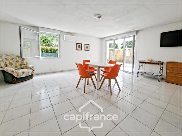 Appartement climatisé 3 pièces avec jardin, parking, cave et piscine commune