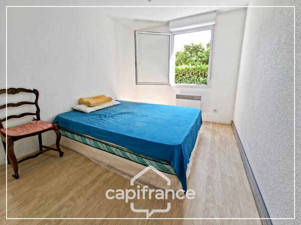 Appartement climatisé 3 pièces avec jardin, parking, cave et piscine commune